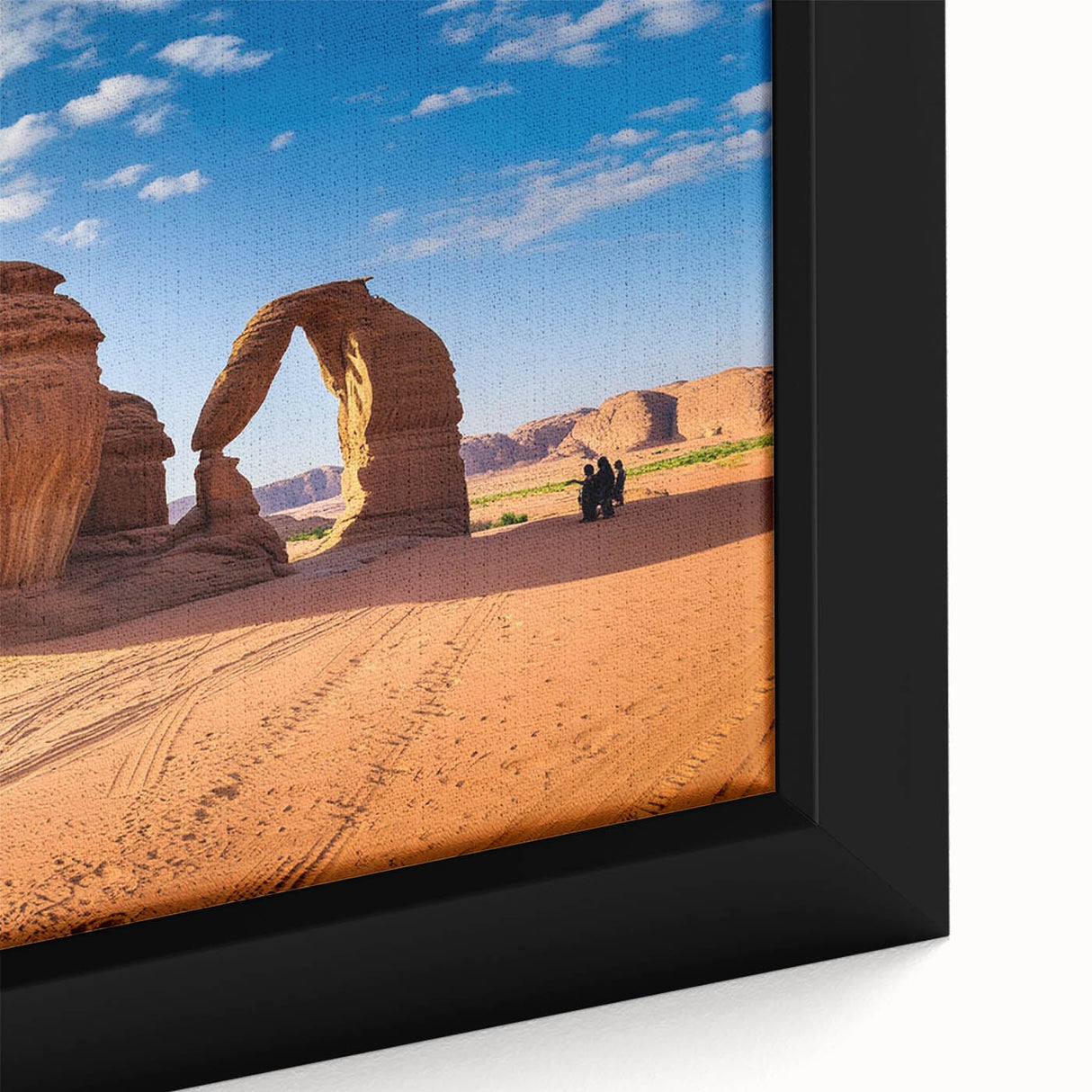 Extra large framed canvas featuring a textured depiction of a Middle Eastern scenery in black with colorful accents.