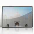 Large abstract wall art depicting the Abu Dhabi skyline in muted gray and blue tones, framed in black acrylic.