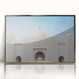 Mid-century modernist style large art print of Abu Dhabi skyline in gold and blue tones on framed acrylic.