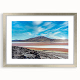 Textured abstract art print depicting a Chilean landscape in earthy tones, framed in silver, ideal for bedroom art.