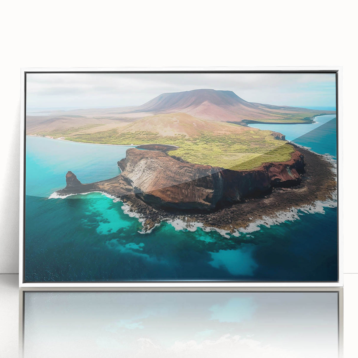 Acrylic print of a Galapagos scenery with lush greenery and blue waters, framed in white, suitable as modern art wall decor.