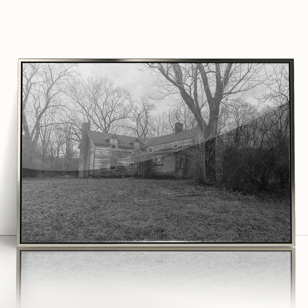 Mid-century modernist art depicting Delaware scenery in muted earth tones on a silver-framed acrylic print.