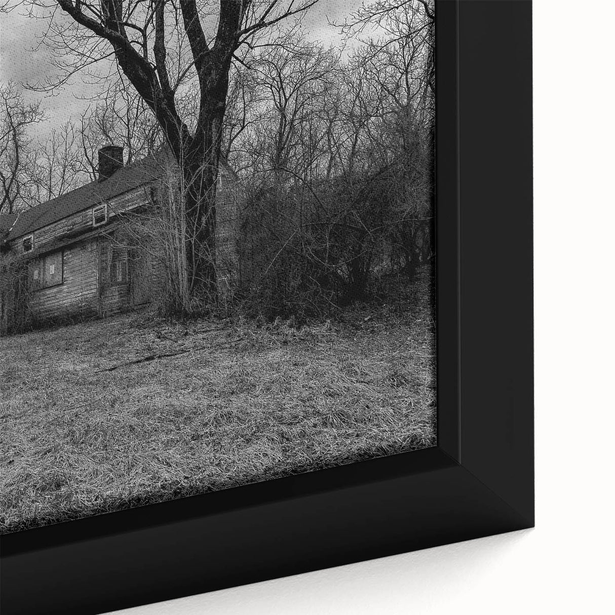 Close-up of black wall art featuring a textured Delaware scenery in vibrant colors on a framed canvas.