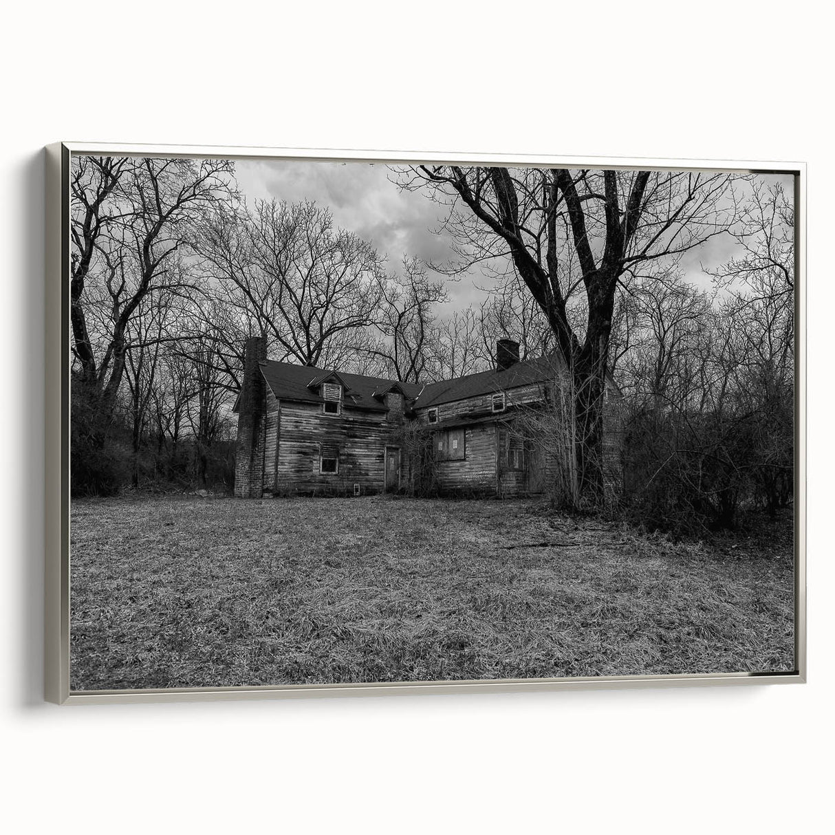 Landscape art painting of Delaware scenery on a framed canvas, with silver accents and a mix of colorful and black tones.