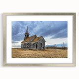 Textured abstract art print depicting Iowa scenery in muted earth tones, framed in silver, ideal for bedroom decor.