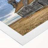 Art deco poster of Iowa scenery on rolled canvas, featuring muted earth tones, ideal for dining room wall art.
