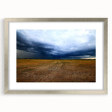 Textured abstract art print featuring muted earth tones on a framed canvas, suitable for bedroom decor.