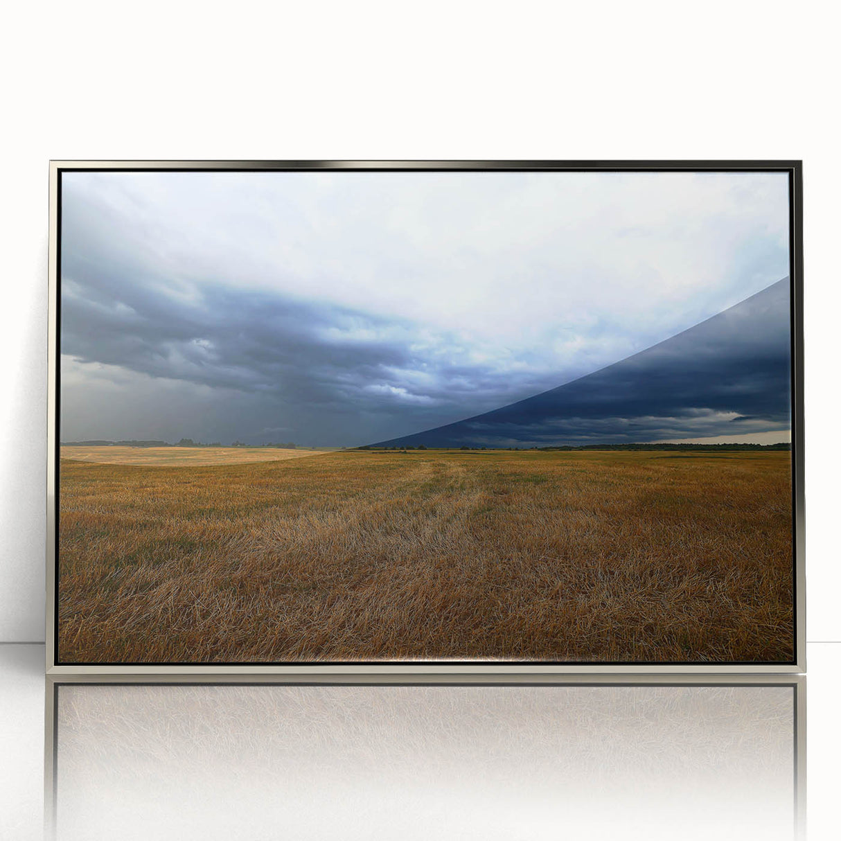 Mid-century modernist art depicting Kansas scenery in muted earth tones on a silver-framed acrylic print.