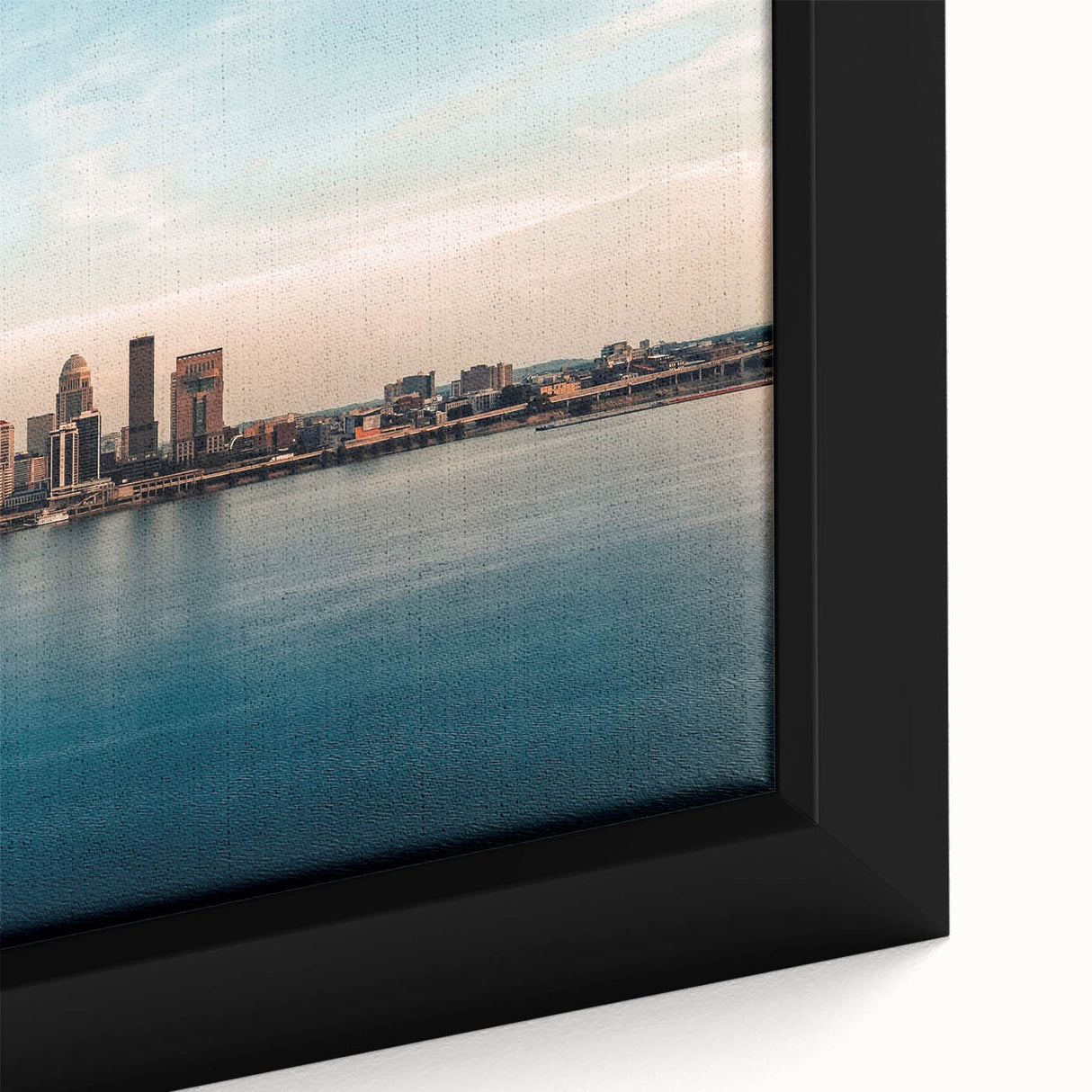 Close-up of textured black wall art depicting a Kentucky landscape on a framed canvas, featuring vibrant colors.