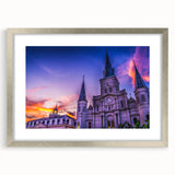 Textured art print of an abstract New Orleans scene in muted blue and gray tones on a framed silver mat.