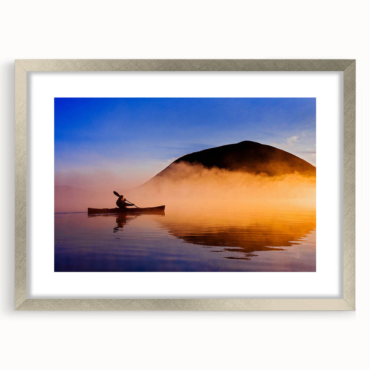Textured art print featuring an abstract depiction of Maine scenery in muted blue and gray tones on a framed silver mat.