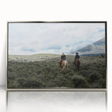 Large art print of Montana scenery in muted earth tones, framed in silver acrylic, suitable for modern nursery decor.