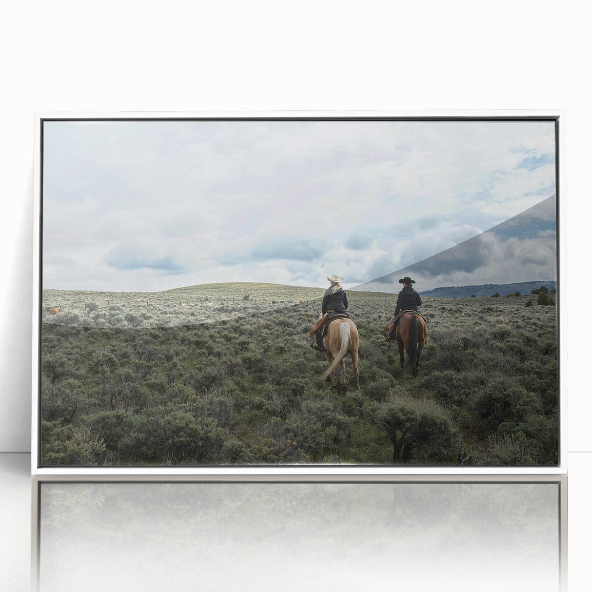 Modern art wall decor featuring a serene Montana landscape in muted greens and blues, acrylic print in a white frame.