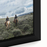 Black wall art featuring a textured Montana landscape in vibrant colors on a framed canvas, ideal for living room decor.
