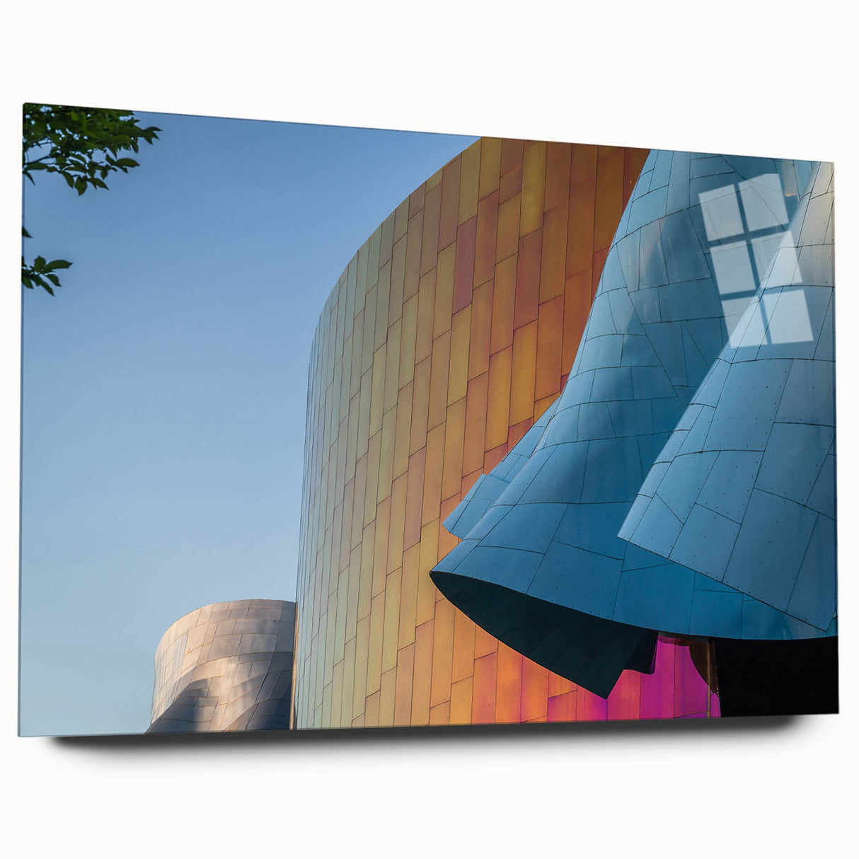 Large abstract wall art of Seattle skyline in muted blue and gray tones on acrylic glass.