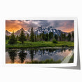 Rolled print of the Grand Tetons with lush greenery and rugged mountains, in soft earth tones.