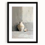 Abstract minimalist wall art framed in black, showcasing soft geometric shapes in neutral tones, ideal for modern home decor.