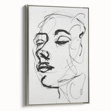 Framed abstract figurative canvas art with a sleek silver frame, showcasing vibrant colors and dynamic shapes, perfect for contemporary home decor.