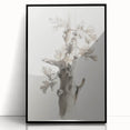 Framed acrylic artwork showcasing vibrant abstract floral design in shades of pink and green, presented in a sleek black frame, ideal for modern home decor.