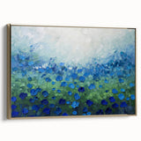 Framed canvas artwork displaying an abstract floral design with vibrant colors, featuring a gold frame that enhances the modern aesthetic for home decor.