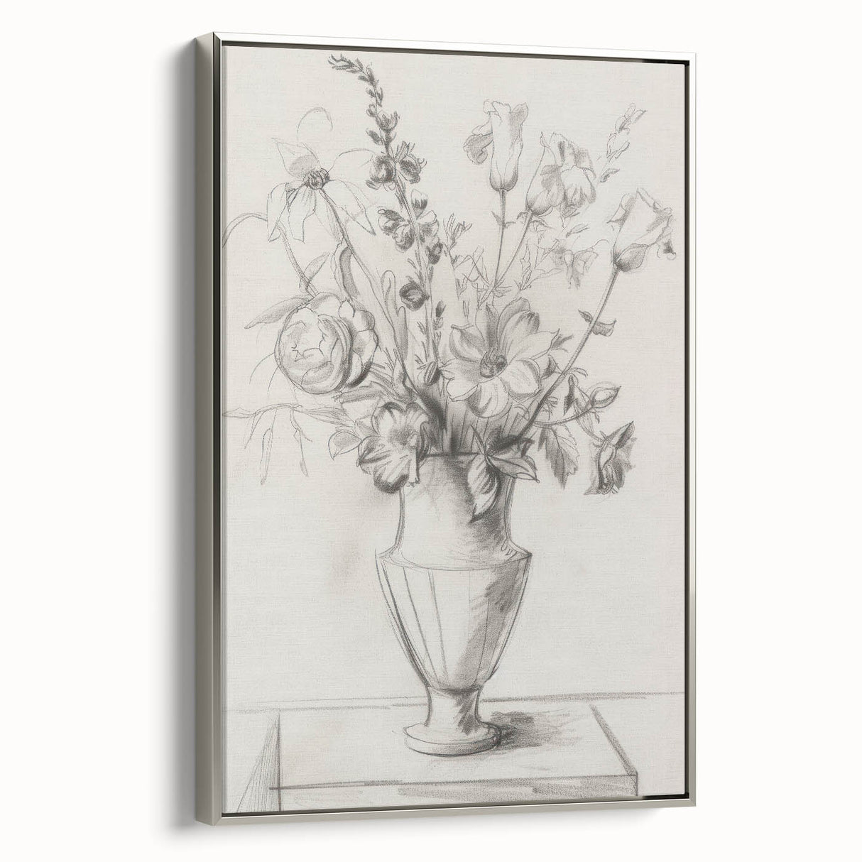 Framed canvas artwork showcasing abstract floral designs in vibrant colors, accented with a sleek silver frame, perfect for modern home decor.