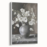 Framed abstract floral canvas art in a white frame, showcasing vibrant colors and intricate patterns. Perfect for adding a modern touch to home decor.