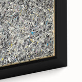 Close-up of an abstract splatter design on a framed canvas, showcasing vibrant color blending and dynamic textures, ideal for modern home decor and artistic ambiance.