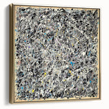Framed canvas artwork showcasing an abstract design with silver and gold splatters, perfect for modern home decor. Ideal for adding elegance to living spaces.