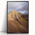 Framed acrylic artwork showcasing a serene desert landscape in vibrant colors, featuring a black frame that enhances the visual appeal. Perfect for modern home decor.