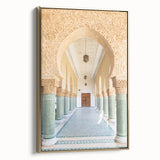 Framed canvas landscape art painting of a Moroccan scenery in muted gold and black tones.