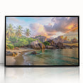 Large abstract wall art depicting a serene Seychelles scenery in muted blue and green tones, framed in black acrylic.