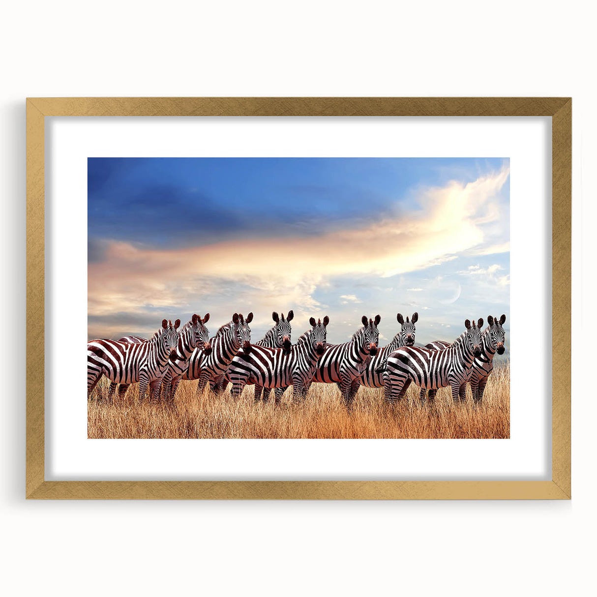 Extra large abstract art print of a Tanzanian scenery in muted earth tones on a textured canvas, framed in gold.