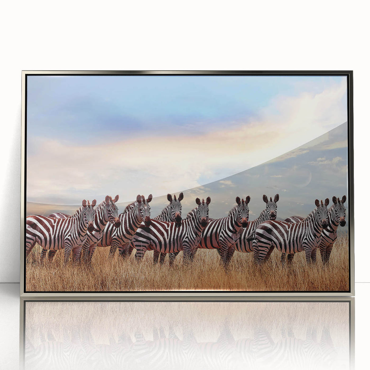 Mid-century modernist art depicting Tanzanian scenery in earth tones on a silver-framed acrylic print.