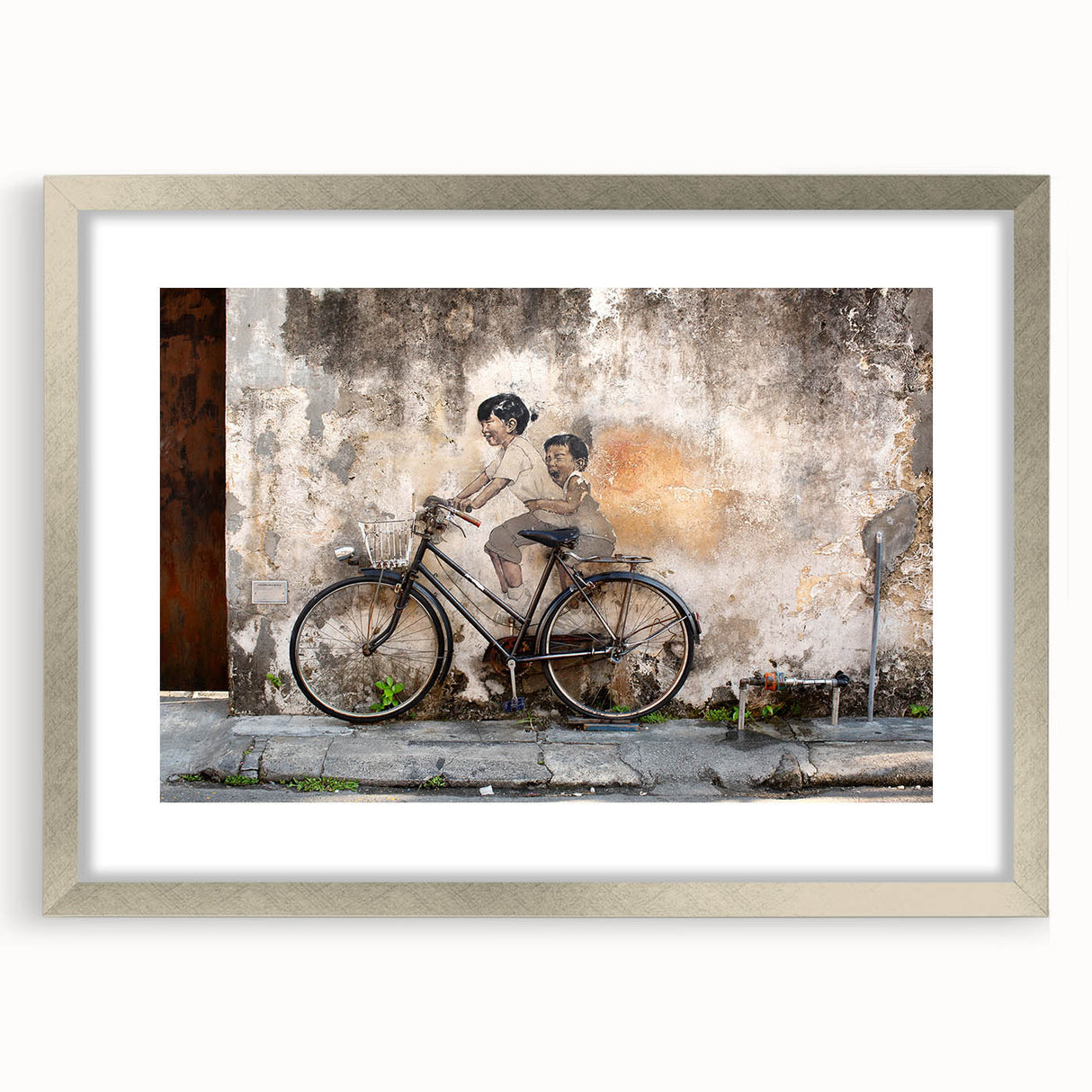 Textured abstract art print depicting a Malaysian landscape in muted earth tones, framed with a silver mat.