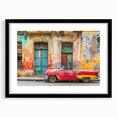 Colorful abstract art print of Caribbean scenery on textured canvas, framed in black, ideal for living room decor.