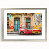 Extra large abstract art print of a textured Caribbean scene in muted blue and green tones, framed in silver.