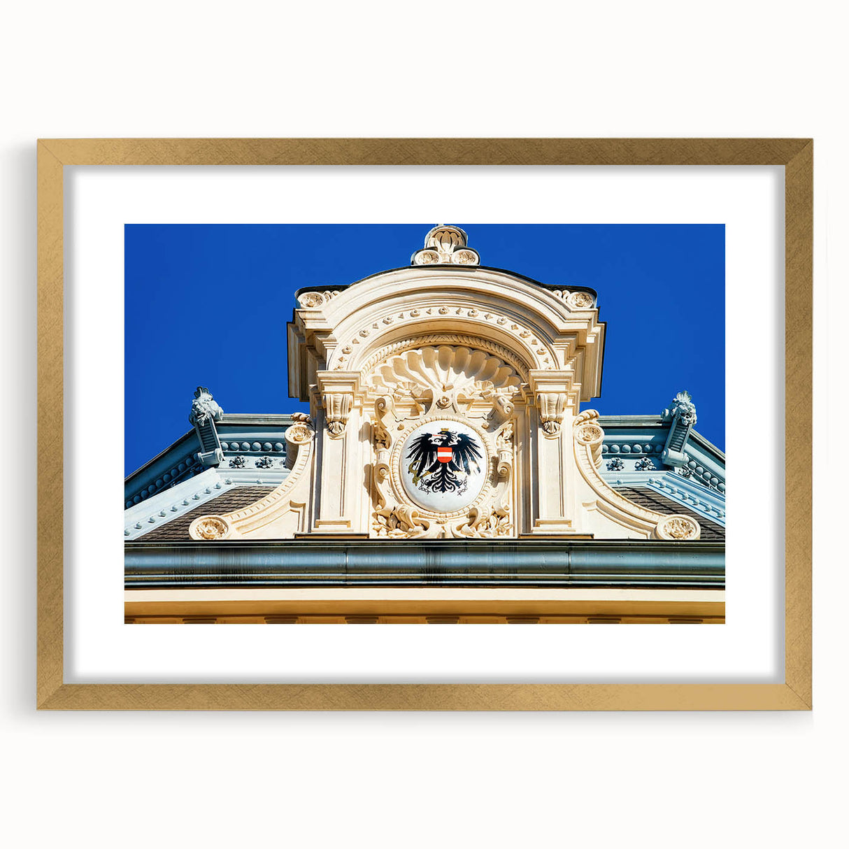 Abstract art print depicting a European scenery in muted earth tones, framed in gold, ideal for dining room decor.