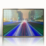 Art deco poster of a European cityscape in gold and black tones on framed acrylic.