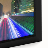 Black wall art featuring a textured, colorful European cityscape on an extra large framed canvas.