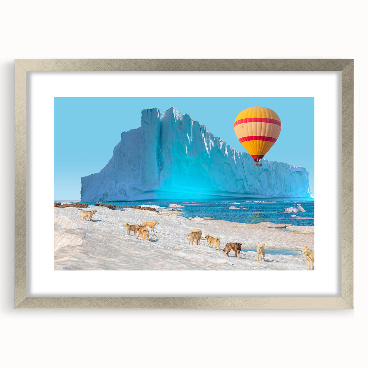 Extra large abstract art print of a textured Greenland scenery in muted green and blue tones, framed in silver.