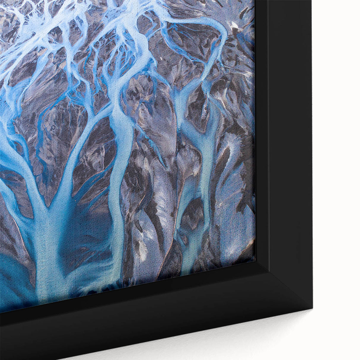 Close-up of a textured black wall art depicting a serene European scenery, ideal for living room ambiance.