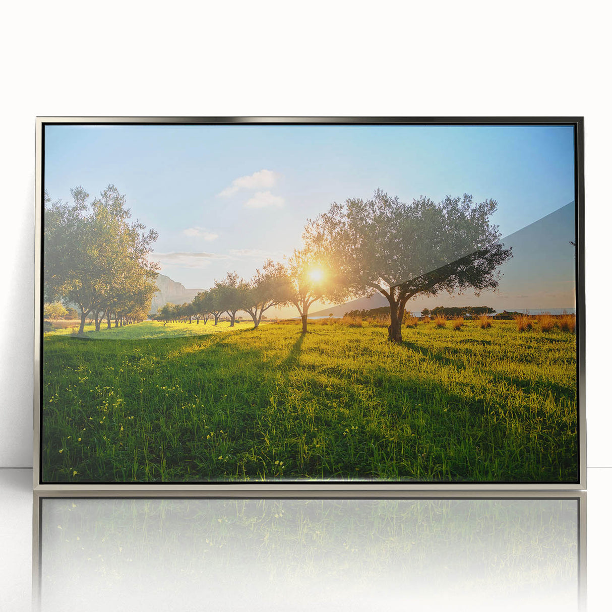 Large art print of a Sicilian landscape in muted earth tones on a silver-framed acrylic, suitable for modern art wall decor.