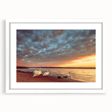 Textured art print of a European landscape in muted earth tones on a framed white mat, ideal for bedroom decor.