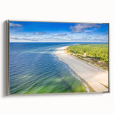 Framed canvas featuring a vintage-style landscape painting of a European scenery in muted earth tones.