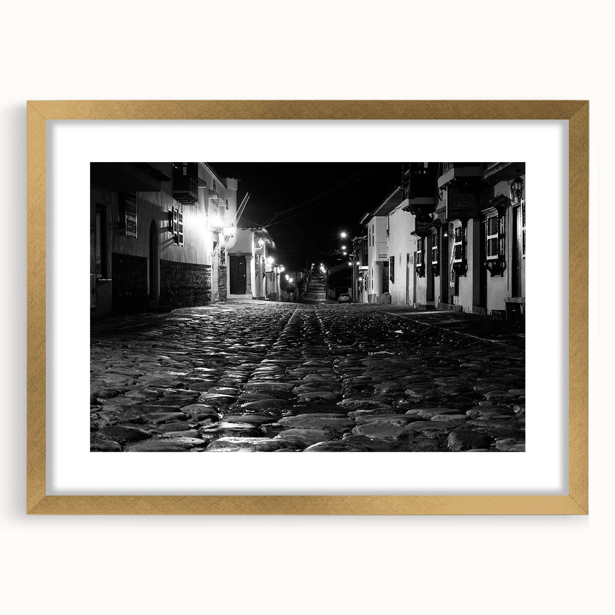 Abstract art print of Barcelona scenery in muted gold and blue tones, framed with a mat, ideal for dining room decor.