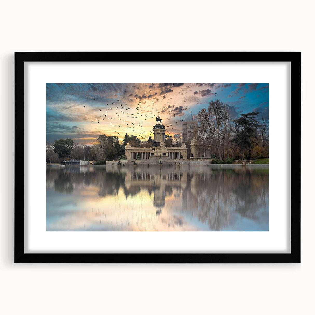Colorful abstract art print of Madrid scenery in vibrant hues on a large framed canvas, ideal for living room decor.