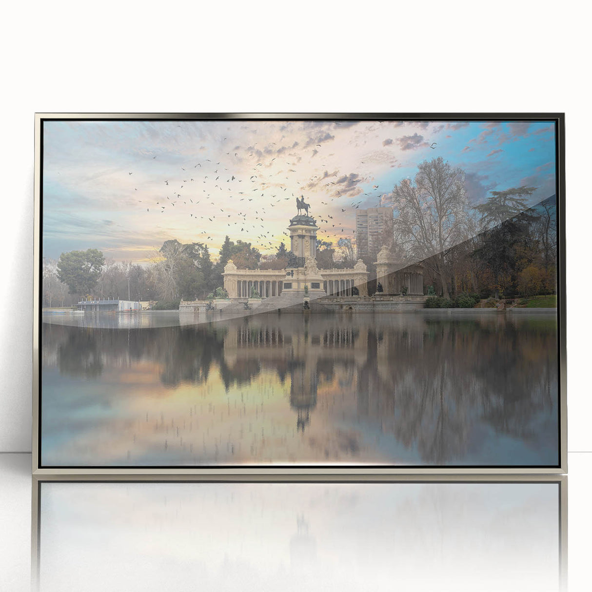 Mid-century modernist art of Madrid skyline in muted gray and blue tones on silver-framed acrylic.