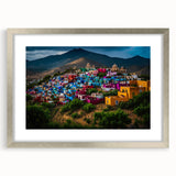 Textured art print of abstract Oaxaca scenery in muted earth tones, framed in silver, ideal for bedroom art.