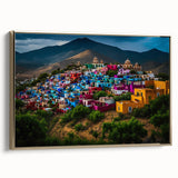Framed canvas wall art featuring a vintage-style landscape painting of Oaxaca, Mexico, in muted gold and black tones.