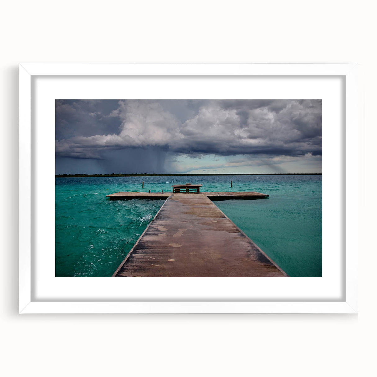 Abstract art print featuring vibrant blues and greens of Quintana Roo scenery on a white-framed mat.